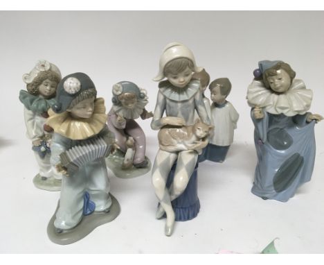 A collection of six Nao porcelain figures of various design.