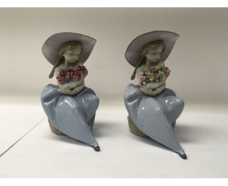A pair of Lladro “Fragrant Bouquet” figures numbered 5862 and 7215