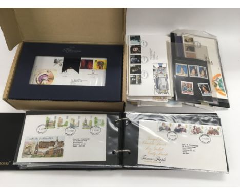 A collection of presentation packs and first day covers.