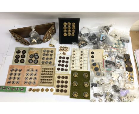A collection of various button including military, rolled gold, a set of Zodiac signs, mother of pearl and bright cut