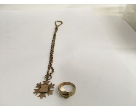 A 9 ct gold buckle ring and a 9 ct gold pendant on chain 8 grams approx