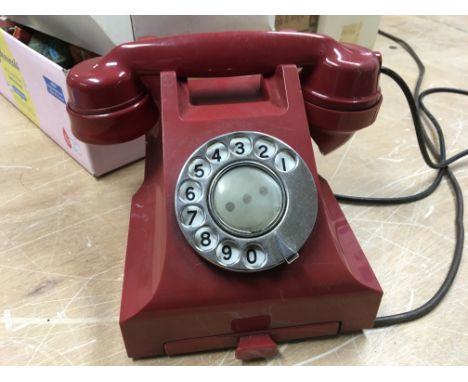 A vintage red telephone