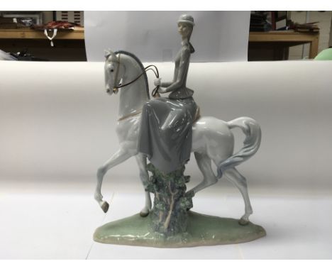A Lladro equestrian figure No. 4516 “Woman on horse”