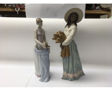 A pair of figures, a Nao No. 120251"Woman with wheat" and a Lladro No. 6771 "Someone to look up to"