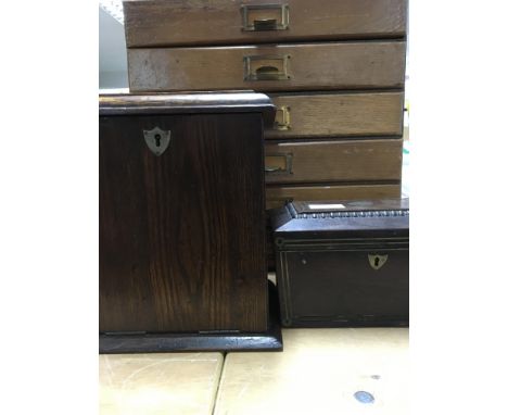 A small collectors cabinet a stationery box and a tea caddy