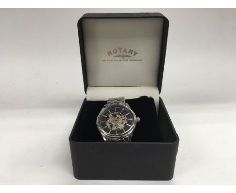 An automatic gentlemanÕs skeleton Rotary watch with a box