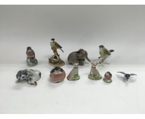 A collection of bird and animal ceramic figures to include Royal Copenhagen and Worcester