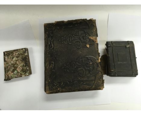 Three Victorian photo albums containing portrait shots