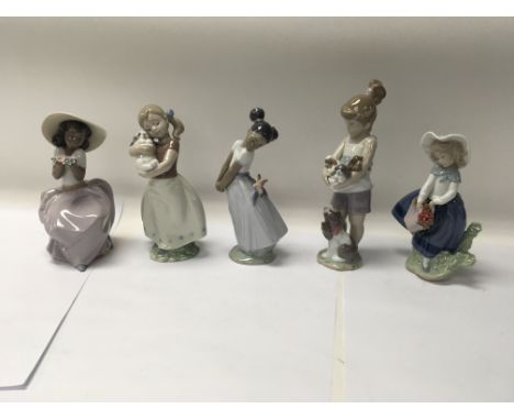 A collection of five Lladro figures to include No. 8131 “Pretty Bird” and No. 8705 “Pretty pickings”