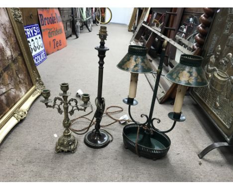 A collection of light fittings and candlesticks.