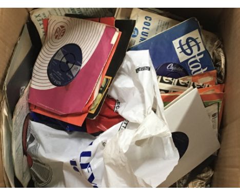 A box containing Vintage 45rpm Single Records