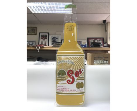 A vintage heater and a large plastic Sol beer advertising bottle sign (height approx 100cm)