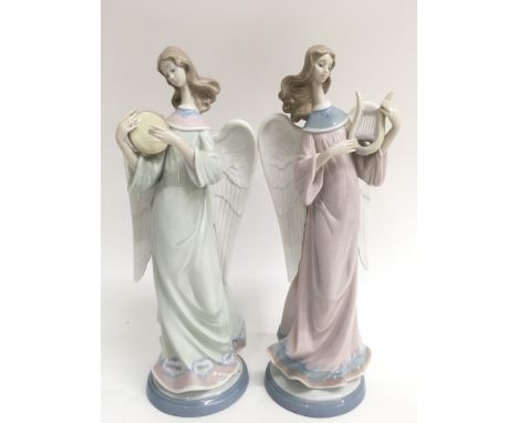 Two boxed Lladro candle holders, model 5959 ‘Angel With Lire’ and model 5950 ‘Angel With Tambourine’.
