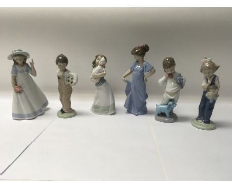 A collection of Six Nao figures including No. 1881 “someone is calling “and No. 1068 “Wann play “