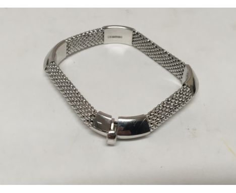 A 9ct modern design white Gold bangle 18g approximately.