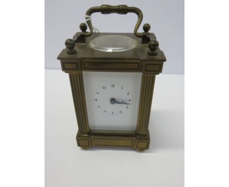 MINIATURE CARRIAGE CLOCK, a brass case bevelled glass miniature carriage clock with Arabic detailed face 3.5" high 