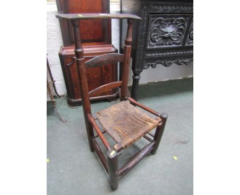 COUNTRY FURNITURE, a Provincial ladder back chair with lift top rush seated panel