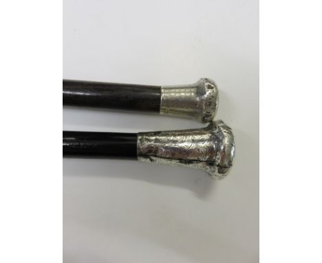 2 SILVER CAPPED OPERA CANES