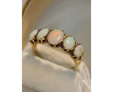 VINTAGE 9CT GOLD 5 STONE OPAL RING, 5 natural graduated opals, graduating from centre stone, size T