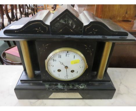 BLACK MARBLE MANTEL CLOCK, an architectural design inlaid mantel clock with presentation plaque 11" high 