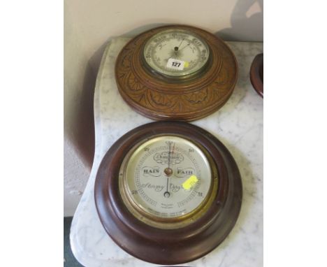 BAROMETERS, carved oak circular framed aneroid barometer and 1 other by Short & Mason