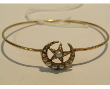 VINTAGE SPRUNG GOLD BANGLE, in the form of a star & crescent moon sent with cultured pearls