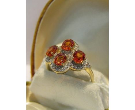 9CT GOLD SUNSET RUBY & WHITE SAPPHIRE CLUSTER RING, with certificate of authenticity from Rocks & Co., 