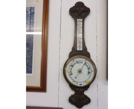 ANTIQUE BAROMETER, a banjo barometer/thermometer in carved wood case, glass cracked