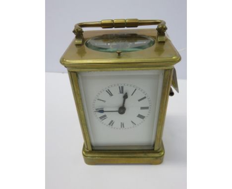 CARRIAGE CLOCK, a brass case bevelled glass repeater carriage clock with coiled bar strike and key 6" high 