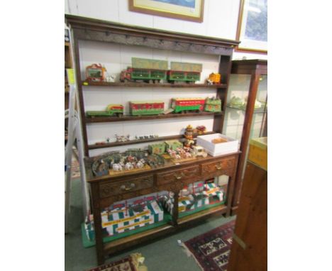 OAK DRESSER, an antique carved oak open shelved back oak dresser with 3 frieze drawers and open shelf base, low relief carvin