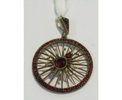 VINTAGE YELLOW METAL SPIDER BROOCH, set with garnets 