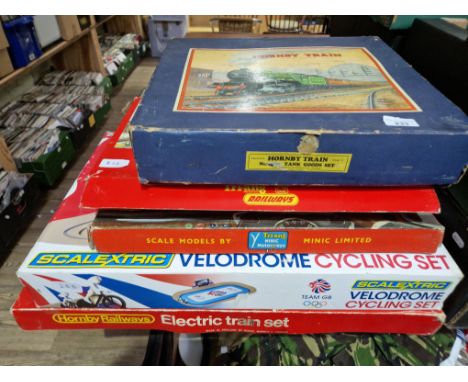 Six boxed model sets to include a Hornby train 0 gauge set, team GB Scalexric velodrome cycling set, Tri-ang RS.7 train set (