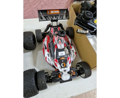 A HPI Racing 4WD nitro engine RC buggy.  