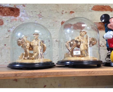 A pair of Eichwald ceramic figurural pipe racks with glass domes, tallest 29cm.P&P:- No in-house p&p available on this lot.  