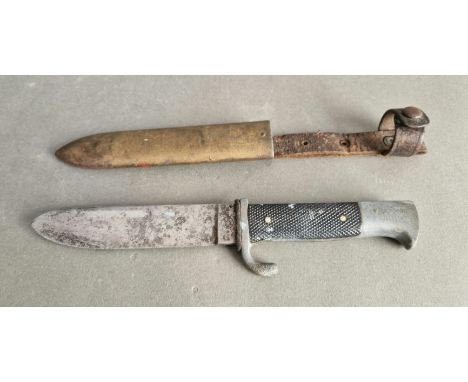 A WW2 German Third Reich Hitler Youth dagger/knife, with makers stamp "Solingen" and marked at base "M7/11 RZM 1939, housed i