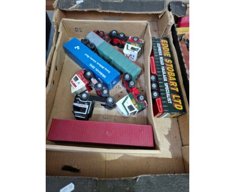 A box of die cast model vehicles, 1/50 scale lorries including Eddy Stobart.  