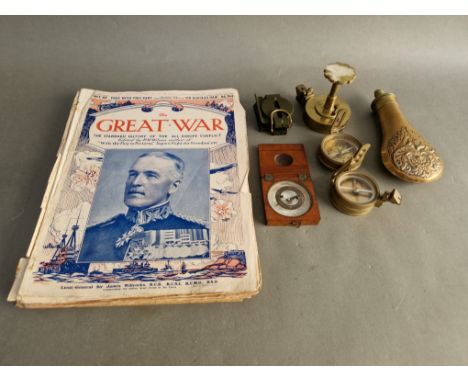 A collection of compasses to include a Victorian mahogany cased example, a green painted one, 3 brass examples together with 