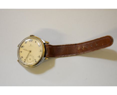 An unusual 1920s oversized driver's or pilot's manual wristwatch,Â&nbsp;the Omega signed painted dial having subsidiary secon