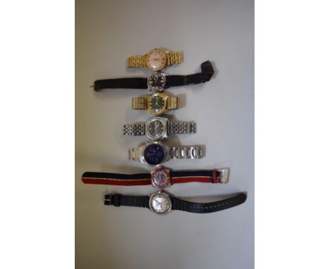 A vintage Timex Grand Prix/Rally model gentlemans manual winding wristwatch, circa 1974; together with six other Timex wristw