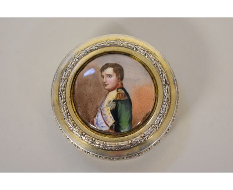 A French silver gilt snuff box,Â&nbsp;by Edouard Clerc, the lid setÂ&nbsp;porcelain plaque depicting Napoleon III, 5.5cm diam