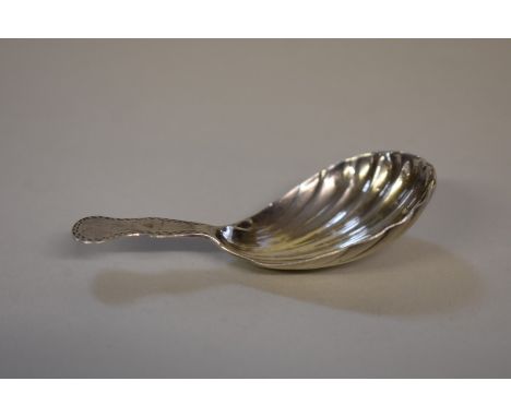 A Georgian bright cut silver shell caddy spoon, by Solomon Hougham,&nbsp;London 1797, 8cm, 9g. 