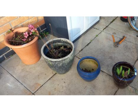 A terracotta planter &amp; 3 other ceramic pots
