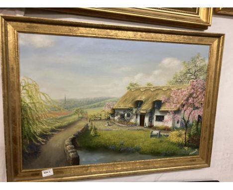 An Oil on canvas Thatched cottage signed M Capewell 
