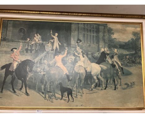 A large gilt coloured framed hunting print 