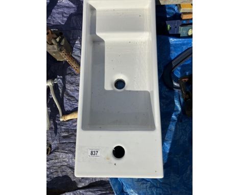 A ceramic butlers sink