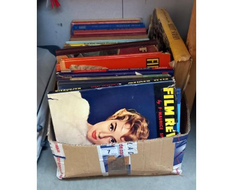 A box of vintage film review books 