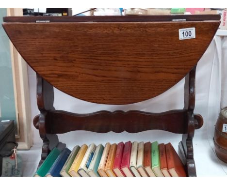 An oak table with drop sides and rotating top, COLLECT ONLY 