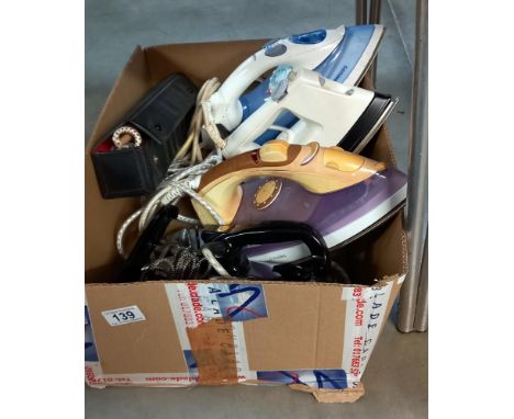 A box of irons including vintage travel irons COLLECT ONLY 
