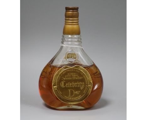 A bottle of Johnny Walker Celebrity, partly evaporated
