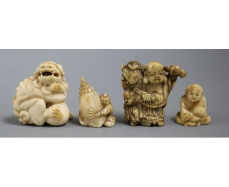 A group of four Japanese ivory or bone netsuke, late 19th/early 20th century